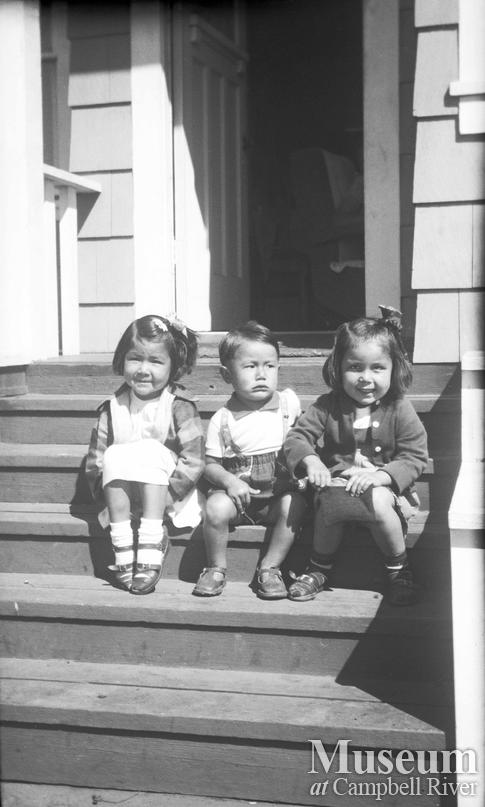 Mercy, Lloyd, and Carol on the steps