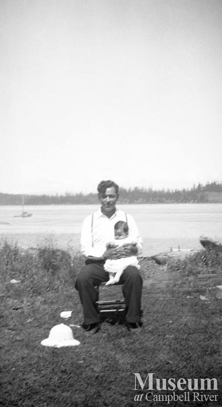 Sam Henderson and child