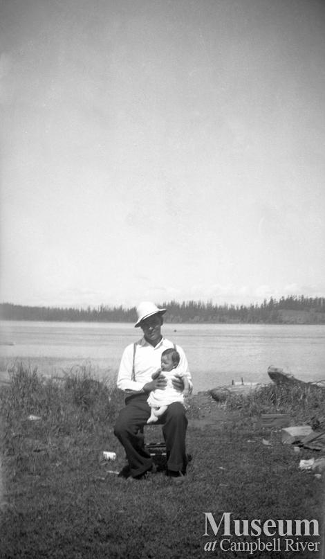 Sam Henderson and child