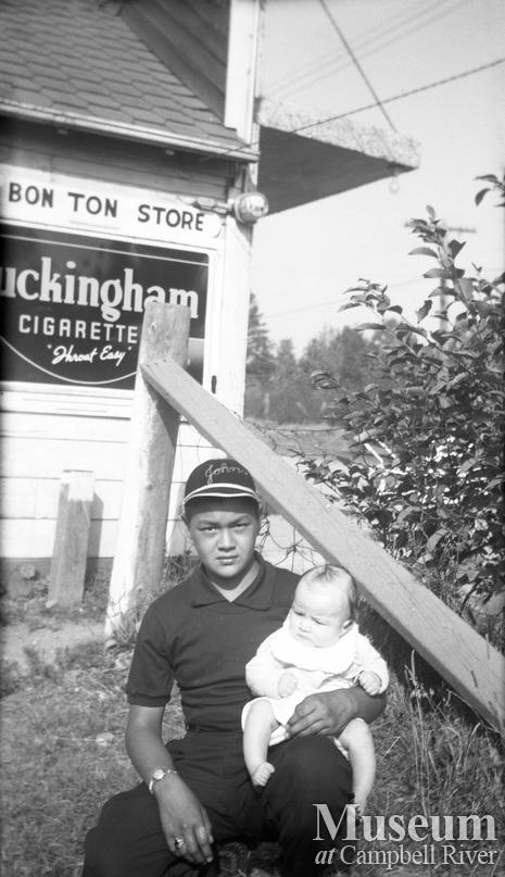 Johnny Ferry Jr. in front of the Bon Ton Store