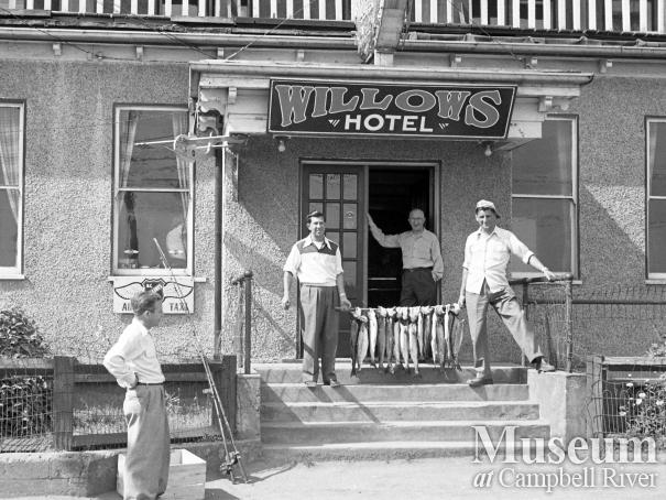 Anglers with their catch on front steps of the Willows Hotel.