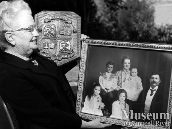 Lillie Thulin with Thulin family portrait, September 1970