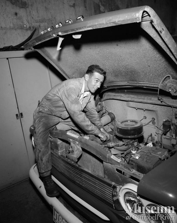 BC Hydro employee doing repairs, Campbell River