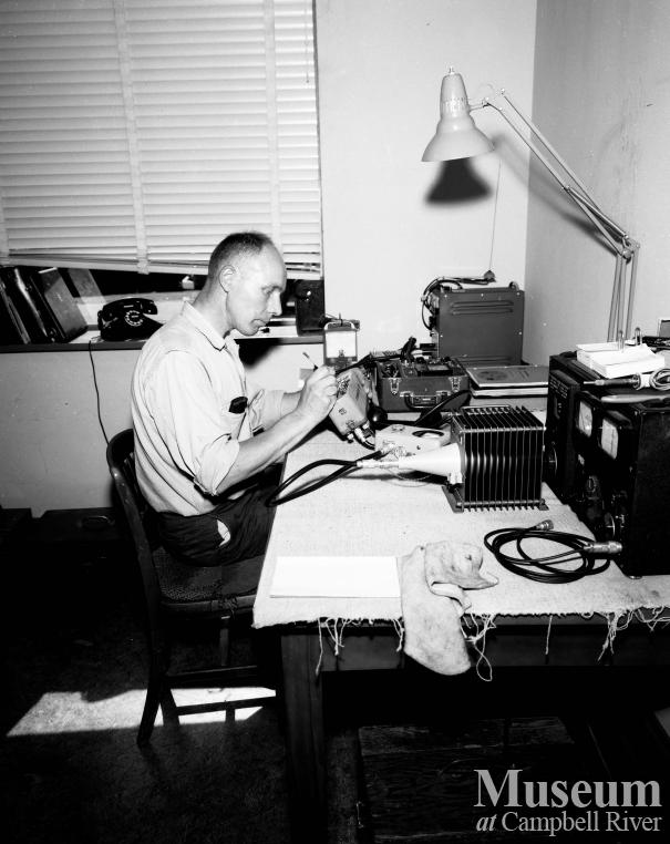 BC Hydro employee doing repairs, Campbell River