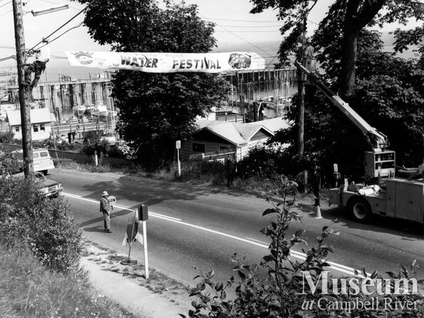 The Water Festival sign on Island Highway