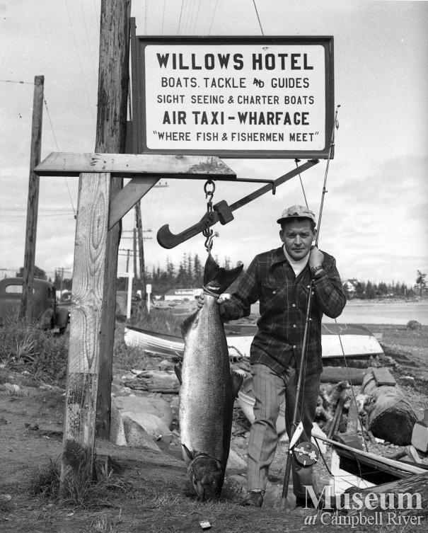 Fisherman with Catch of Salmon at  Willows Hotel Scales