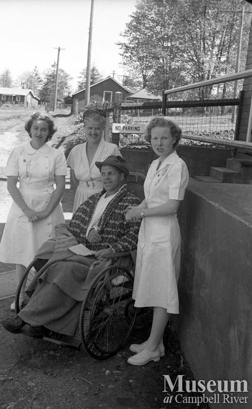Nurses with patient outside Lourdes Hospital, Campbell River