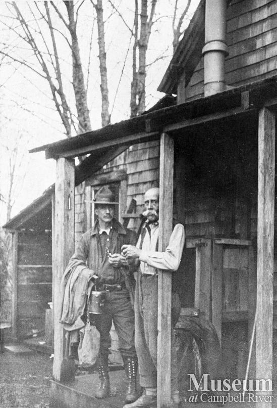 Fred Nunns on right on his porch in Campbellton