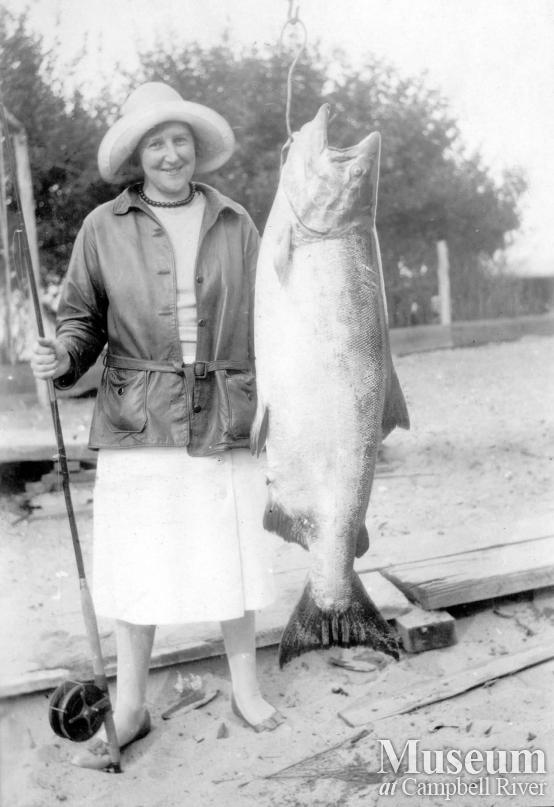 Unidentified angler with a salmon