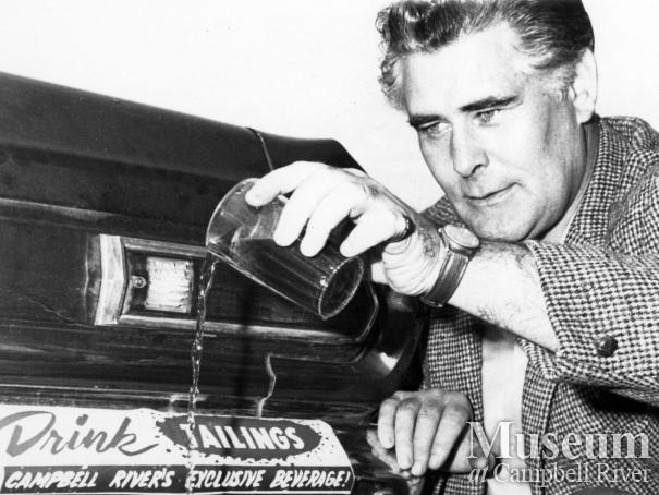 Tony Dolan with bumper sticker regarding Western Mines controversy