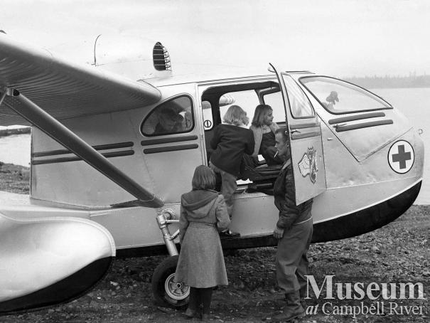 School children having a look at BC Airlines SeaBee